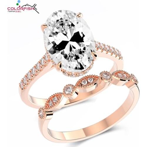 COLORFISH 9mm x 13mm Oval Cut Engagement Ring Set Rose Gold Plating Sterling Silver 5 ct CZ Women Bridal Ring Set