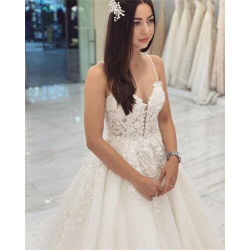 2020 New Wedding Dresses Backless Spaghetti Straps Sweep Train Lace Appliques A Line Organza Bridal Dresses vestidos de novia