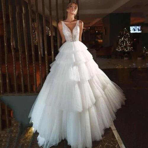 WUZHIYI Trouwjurk RufflesTiered Princess Wedding Dresses A Line Glitter Tulle Sexy V Neck Bride Dresses Backless Bridal Dress
