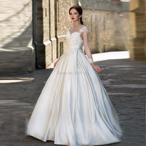2020 Elegant Satin A Line Long Sleeves Wedding Dresses O Neck Bow Sashes Vestido De Noiva Lace Appliques Bridal Wedding Gowns