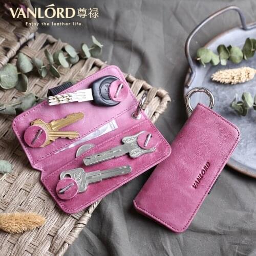 Womens leather key chain, individual fashion, simple mini head leather, Korean lovely creative home key bag