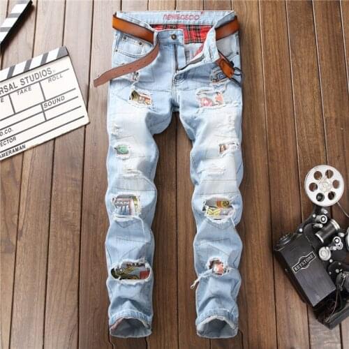Autumn Winter European American style Mens Patchwork Ripped Embroidered Stretch Jeans Trendy Holes Straight Denim Trouers