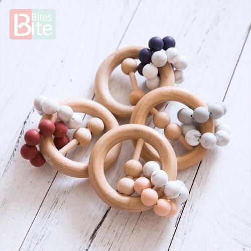 Bite Bites 1pc Baby Wooden Teether Beech Ring Rattle Toys Food Grade Perle Silicone Beads Teething Bed Bell ChildrenS Goods Toy