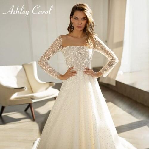 Ashley Carol Long Sleeve Wedding Dress 2021 Elegant Boat Neck Shiny Point Wave Button Beach A-Line Bride Dresses Vestido Noiva