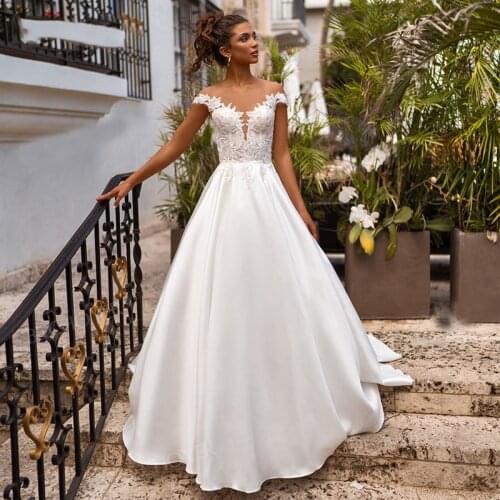 Boho Cap Sleeves Sweetheart Appliqued Satin Wedding Dress 2021 Beach Princess Plus Size Wedding Gowns robe de soirée de mariage