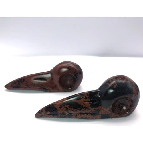 A pair Natural red obsidian crystal bird head crow hand - carved black home desk decoration