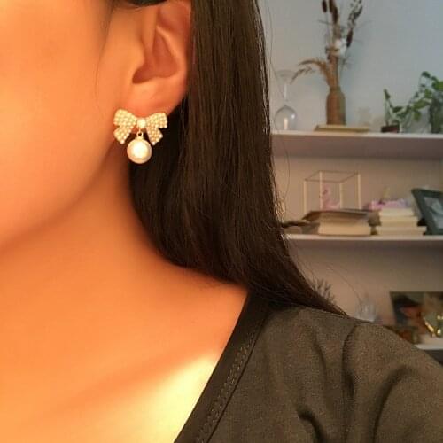 Bowknot pearl earring female rice pearl earring premium French earring 925 silver needle