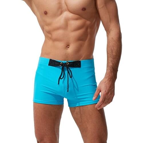 2021 New Mens Boxer Swim Shorts Solid Color Low Waist Beachwear Australian Fashion Sexy Swimsuit Summer Spa Beach Surf Sport