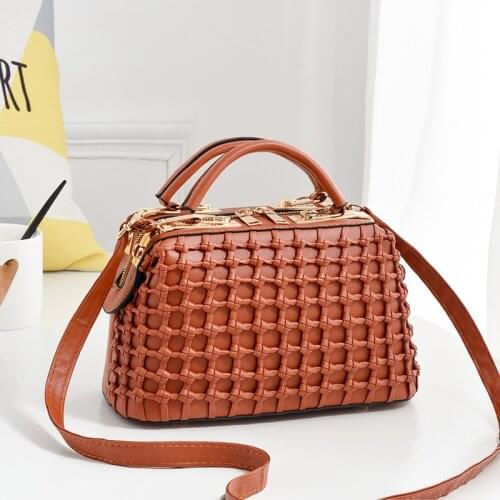 New European and American fashion womens handbag Tide solid color steel clip Boston handbag Boston mishan 24.5X13X16cm