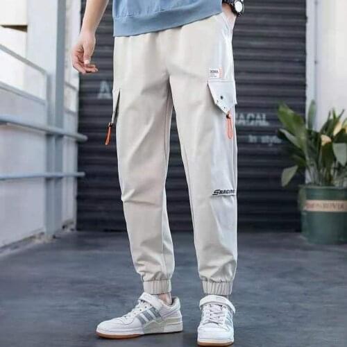 2021 Oversized Men Cargo Pants Streetwear Black Mens Jogging Sweatpants Casual Elastic Waist Harem Pants Male Large Size 5XL