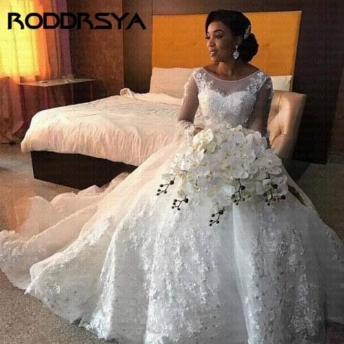 Luxury African Wedding Dresses Long Sleeves Scoop Lace Appliques Beaded Arabic Bridal Gowns 2019 New Fashion Custom Made