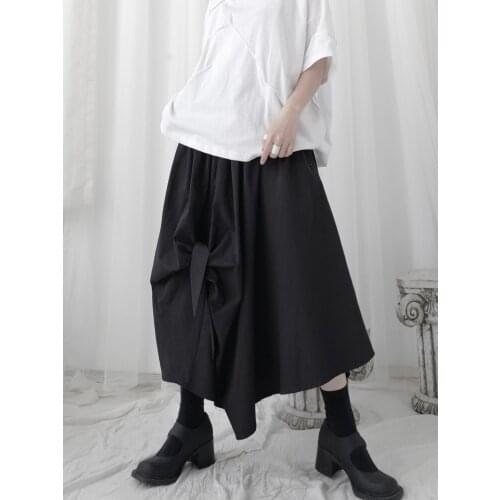 The design feels small minority Japanese original design Yamamoto dark bow irregular mid-length skirt woman
