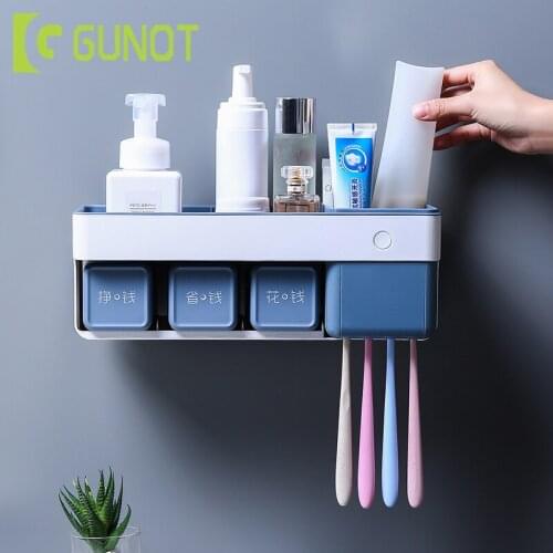 GUNOT Waterproof Toothbrush Holder with Cups Toothpaste Makeup Partition Storage Rack Punch Free Bathroom Accessories Sets