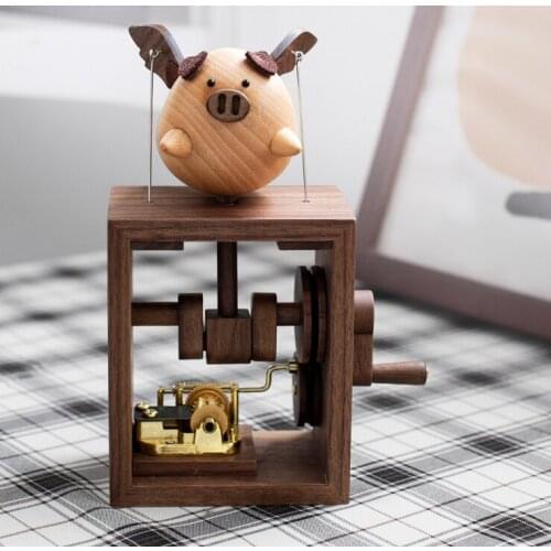 Cute little flying pig hand movement music box J03