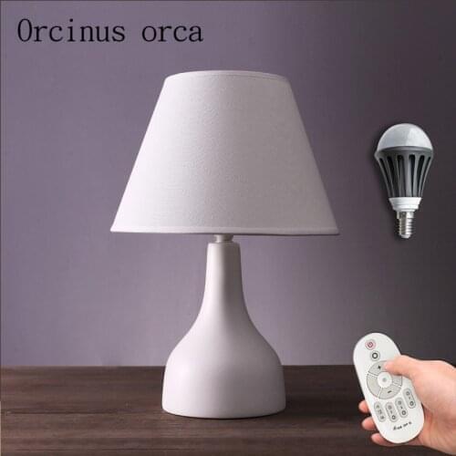 Nordic simple modern table lamp living room bedroom bedside creative American lovely warm ceramic table lamp Postage free