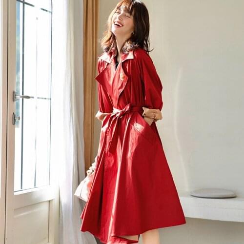 Spring new womens clothes are thin and noble, the court is loose and large, and the long womens windbreaker coat skirt