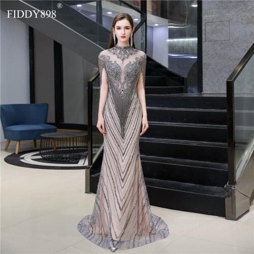Dubai Evening Dress 2020 High Neck Sheer Luxury Crystal Beaded Mermaid Evening Gown with Tassel Formal Dress Robe de Soiree