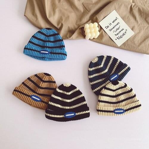 1pcs 2021 baby boys fashion striped knitted hat Children basin cap Trendy fan boy and girl curled labeling woolen melon hat