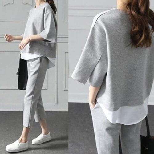 Two-piece suit 2020 spring leisure O-collar fake two-piece top 3/4 trousers two-piece wide loose loose-sleeved cotton jacket
