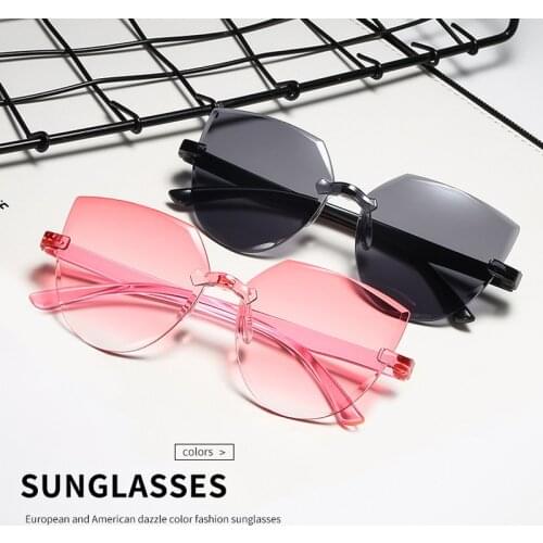 Frameless One-piece Jelly Transparent Sunglasses European and American Candy-colored Cat Eye Integrated Ocean Sunglasses
