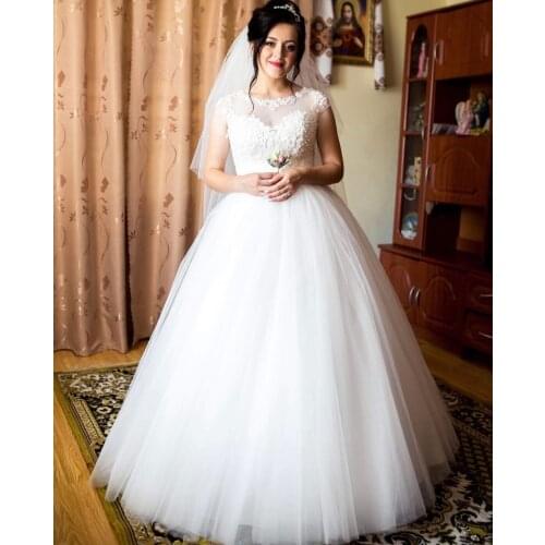 Wedding Dress Ball O-Neck Cap Sleeve Lace Appliques Sequined Illusion Tulle Button Back Floor Length Sweep Train Bride Gown 2021