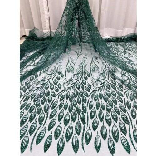 The new exquisite glitter comes on the market with viscose beads, leaf totem, tulle lace, suitable for fashionable womens dress
