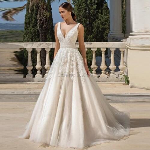 Exquisite A Line Wedding Dresses Vestido De Noiva Double V Neck Sleeveless Lace Appliques Beading Backless Bridal Wedding Gown