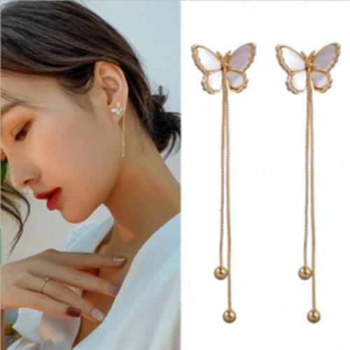 Korean girl heart white butterfly tassel personality fashion long temperament net red dual-use earrings