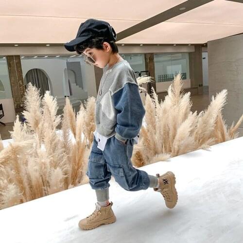 Boys suit autumn 2021 new childrens denim stitching Korean version of the spring and autumn big childrens fashionable two