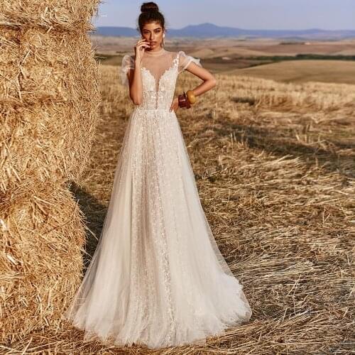 Sexy Backless High Neck Shot Sleeves Wedding Dresses A-Line Sweep Train Lace Appliques Tulle Courtry Bridal Gowns 2021