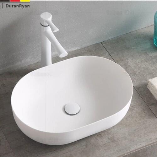 Artificial stone oval lavabo thin edge household matt wash basin wash basin artistic stage basin