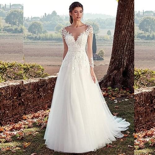 2021 Vintage Lace Applique Long Sleeves Wedding Dresses Alluring Tulle Sheer Jewel Neckline A-line Bridal Gowns vestido de noiva