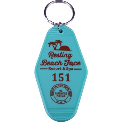 Our ultra cheeky Resting Beach Face Vintage Motel Key Ring is just the smattering of escapism you need in your day