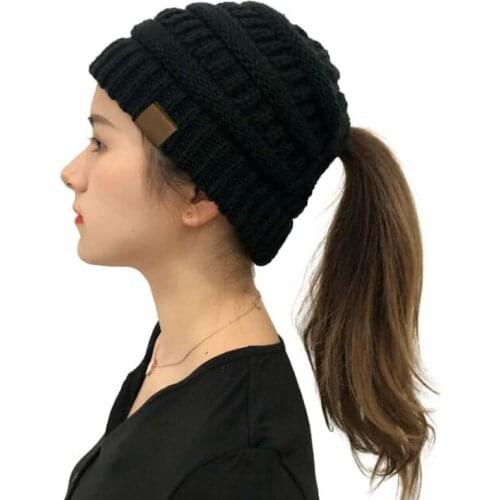 XEONGKVI Europe America Leather Label Cross Horsetail Cap Skullies Beanies Autumn Winter Warm Kintted Hats For Women Behind Open