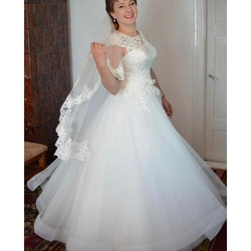 Wedding Dress A-Line O-Neck Cap Sleeve Lace Appliques Sequined Sashes Bow Backless Floor Length Elegant Formal Bride Gown New