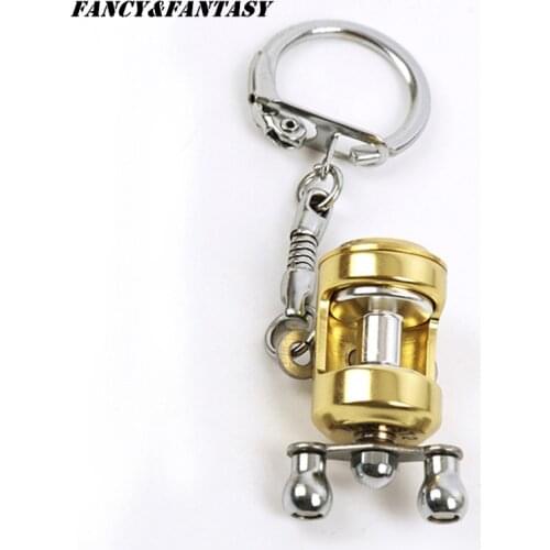 Fancy&Fantasy Fish Wheel keychain Gold Color Fly Fisherman Spinning Fishing Reel Charactor Miniature Key chain With Key Ring