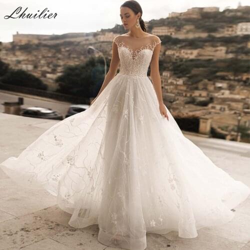 Lhuilier Elegant A-line Scoop Neck Lace Wedding Dresses 2020 Floor Length Cap Sleeves Court Train Illusion Back Bridal Dress