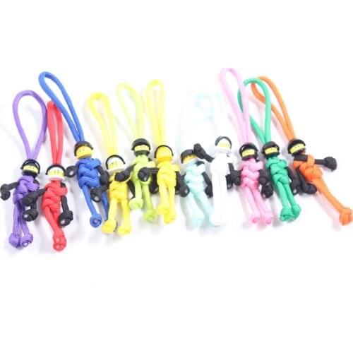 2021 New Smile Building Block Keychain Biker Helmet Pendant Keychain Braided Rope Paracord Buddy Bag Hanging Backpack Doll Toy