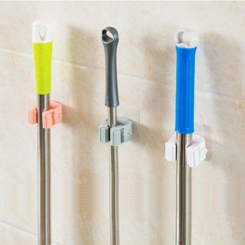 High quality wall mounted mop holder brush broom hanger storage shelf Bathroom Kitchen Non-slip Storage Rack home organizer