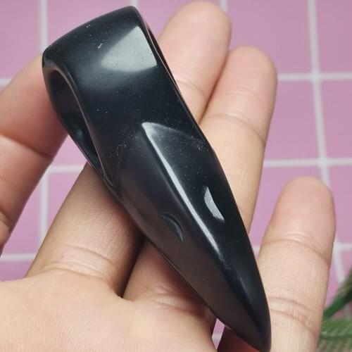 Natural obsidian crystal, the hand-carved beak of the bird allows for the placement of crystal fragments for healing purposes