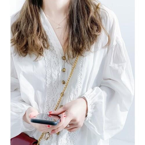 YLO court French design! Personality simple V-neck buckle lace white long sleeve shirt female