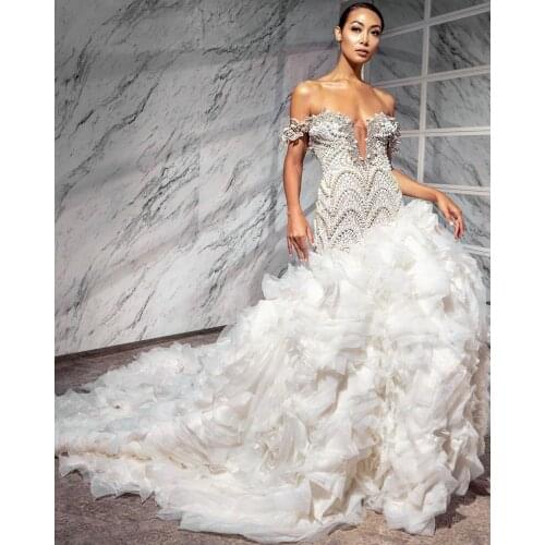 Luxury Pearls Mermaid 2021 Wedding Gowns Tiered Ruffles Off The Shoulder Beaded Crystal Bridal Gown Sweep Train Robe de mariée