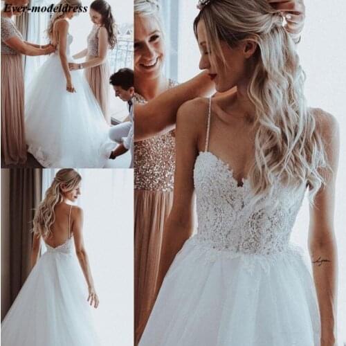 Boho Wedding Dresses 2021 Backless Lace Appliques Pearls Spaghetti Straps A-Line Beach Bridal Gowns Robe De Mariee Cheap