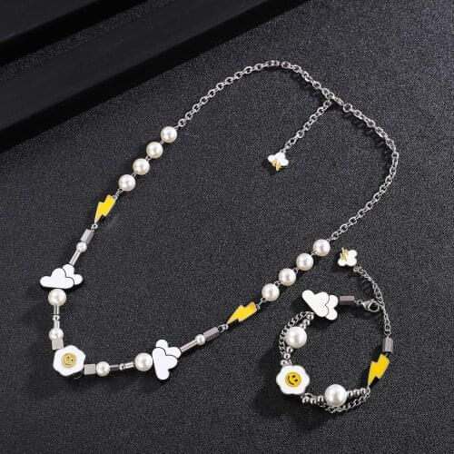 Fashion hip-hop round bead titanium steel lightning cloud flower stitching men and women all-match necklace hot sale