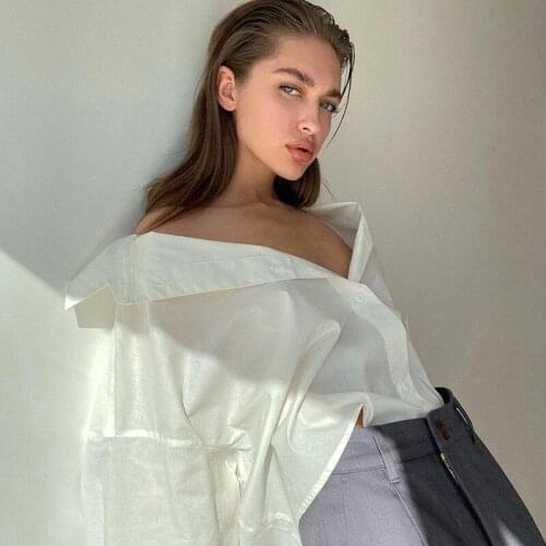 Womens clothing Europe and America 2021 autumn new shirt solid color slim temperament irregular long sleeve commuter white shir