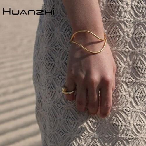 HUANZHI 2020 New Trendy Minimalist Gold Silver Color Twisted Irregular Geometric Metal Bracelet for Women Girls Party Jewelry