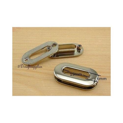 Eyelets metal with washer grommets nickel oval 10 pieces 19 mm AT32