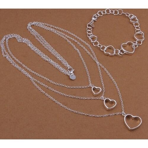 Factory outlets European style hollow heart pendant necklace bracelets fashion women Silver color jewelry sets S425