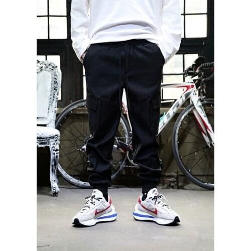 Large mens new solid color pocket decoration trend corset casual pants summer loose sports pants overalls