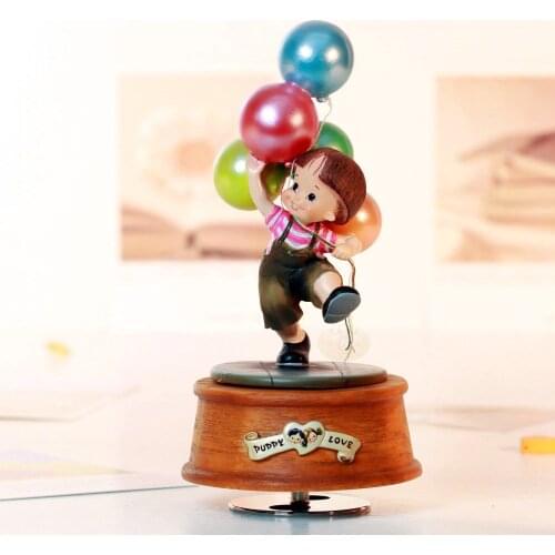A leap of heart rotating decorations boy with balloon music box birthday gift for child